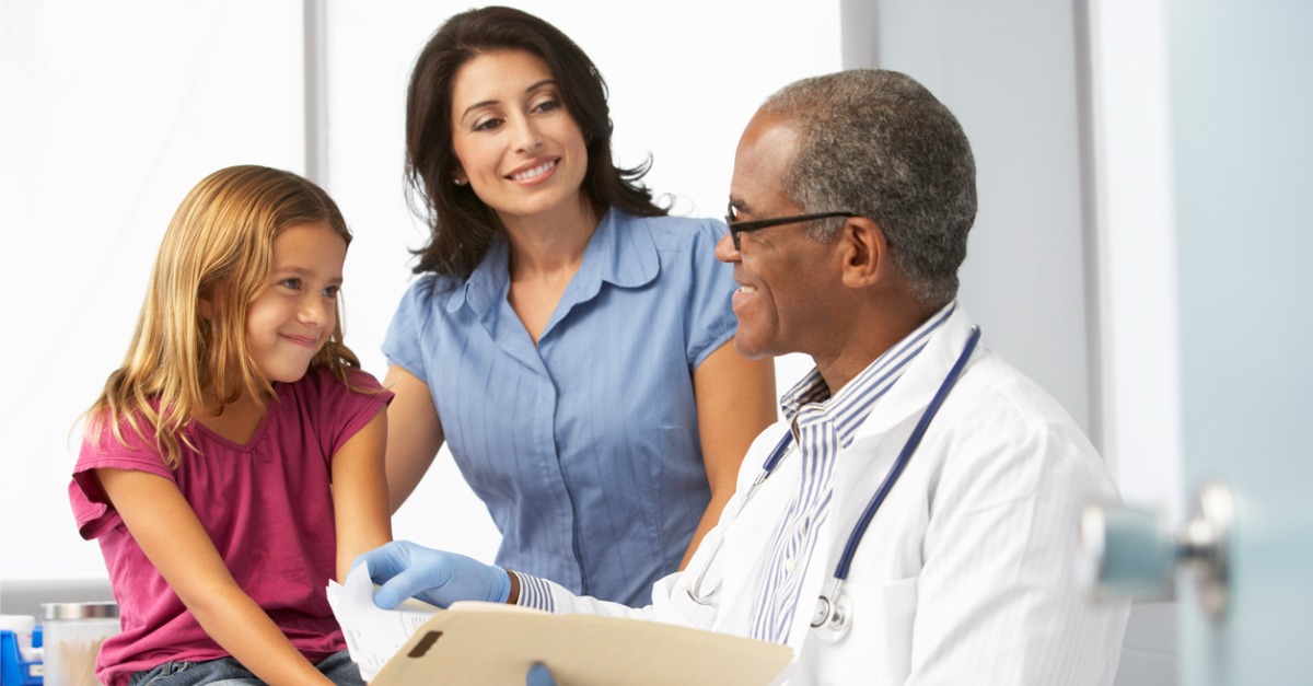 mother and daughter with doctor